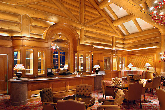 Large log siding and chinking is used in this lounge in Earls Lodge at Snowbasin Resort
