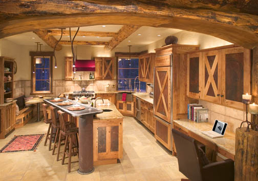 Arched header log forms entrance to kitchen in this hybrid log house