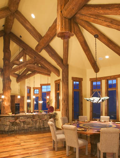 Hybrid log home with unique log hip rafters