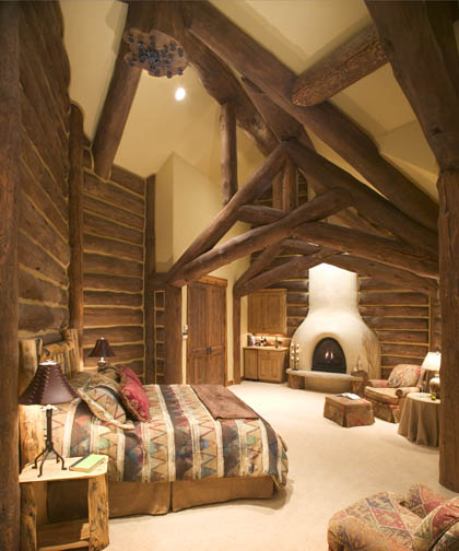 Hybrid log house with log siding and log trusses