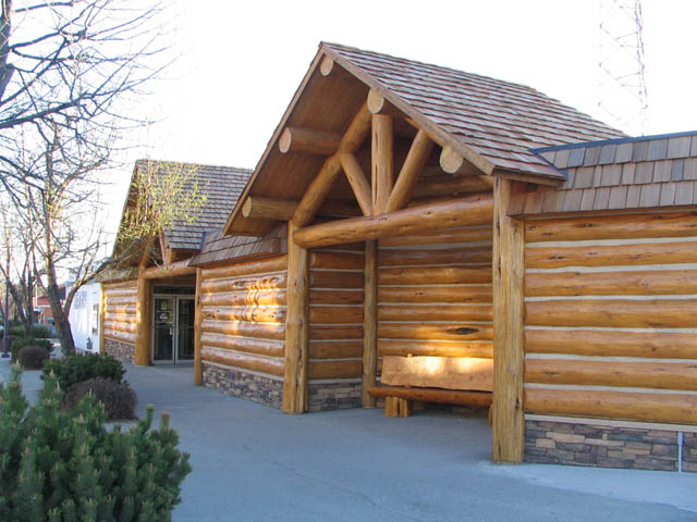 100 Mile House municipal building before log accents