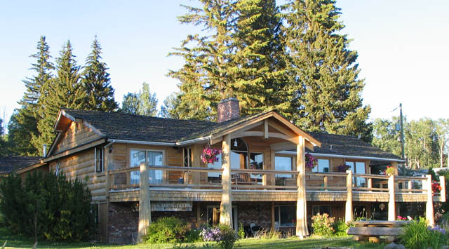 100 Mile House municipal building before log accents