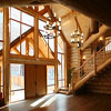 windows framed by logs in BC Canada House