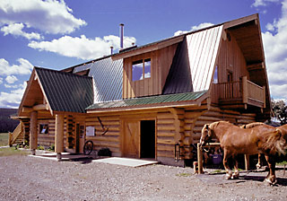 picture of a log barn by Sitka Log Homes