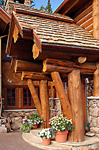 frame house with log accents