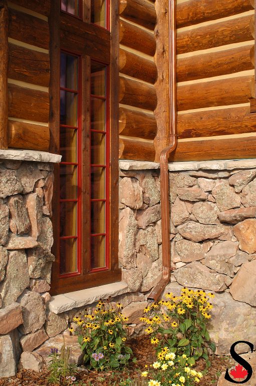 Log siding and stone