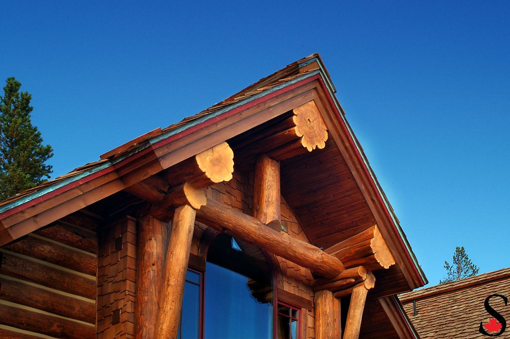 Log truss above window