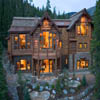 hybrid log house using wood and stone