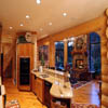 Kitchen in handcrafted log house