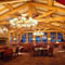 Day lodge dining room with structural log trusses
