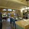 view of front entry from kitchen in log cabin