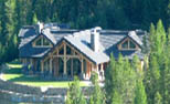 Log house on working ranch acreage