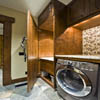 Laundry room in log house