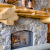 Unique log mantle in resort log home in Sun Peaks Resort, BC