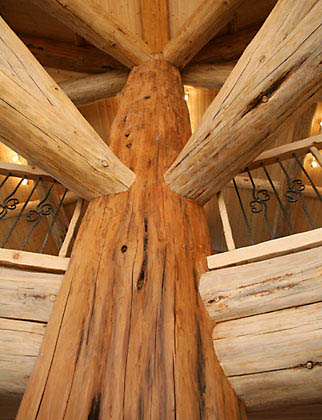 Huge cedar post known as the "Spirit Log" supports the ceiling of BC Canada Place